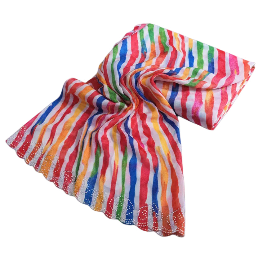 Colorful striped fabric on a light blue background